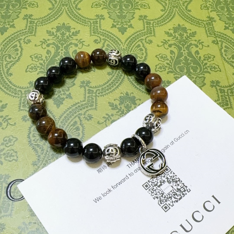 G*u*i bracelets